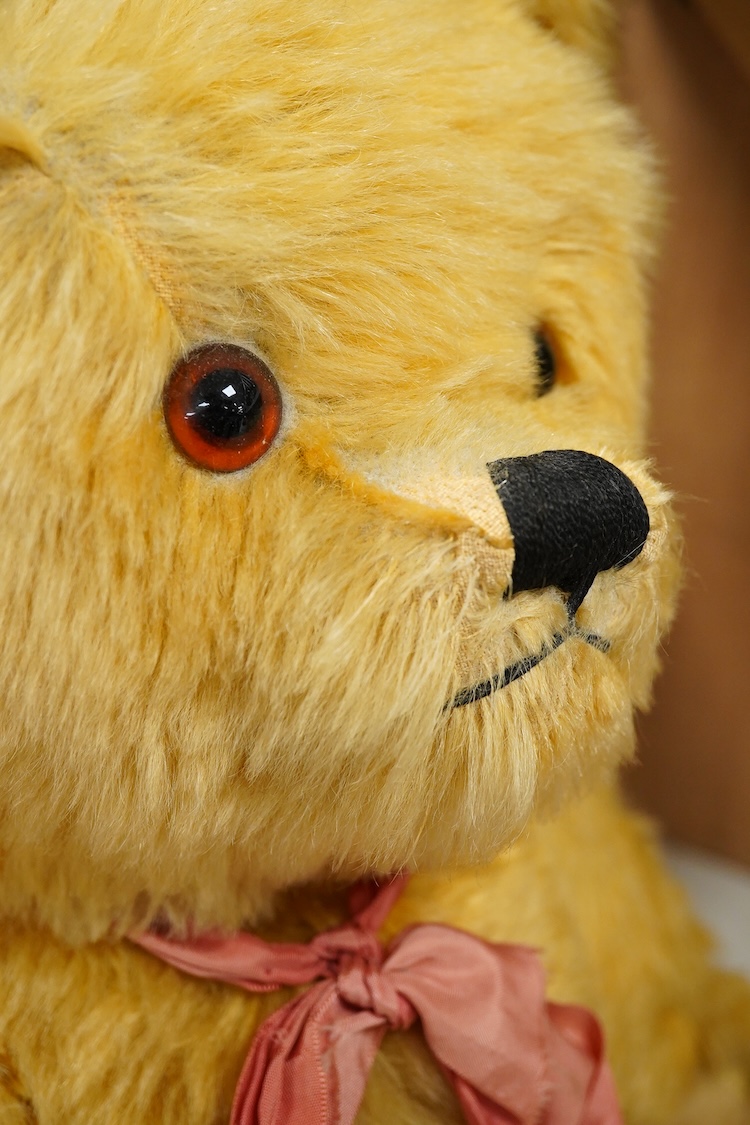 A large mid 20th century English mohair teddy bear with growler, 65cm